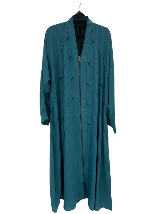 green abaya with black beads